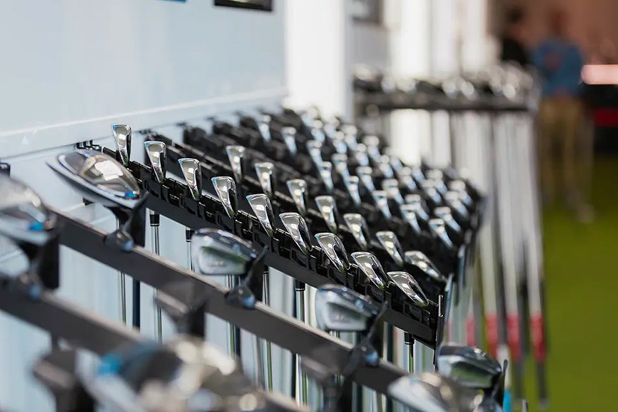Golf irons in a shop.