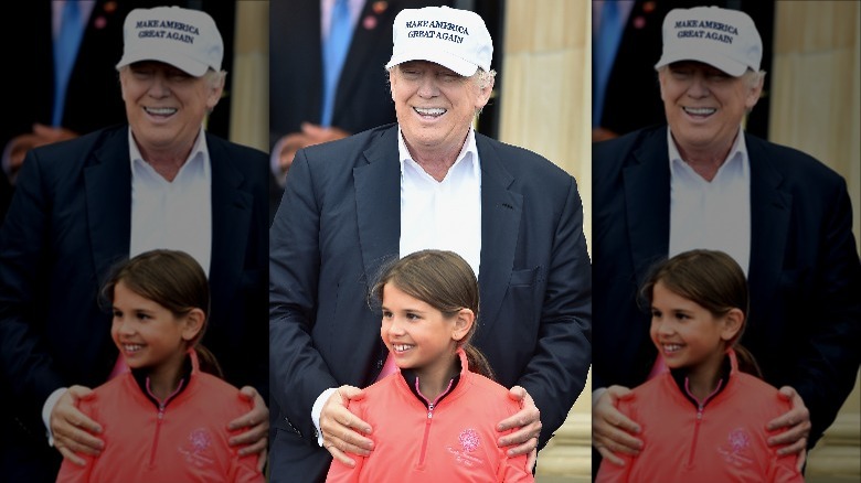 Kai poses with Donald Trump