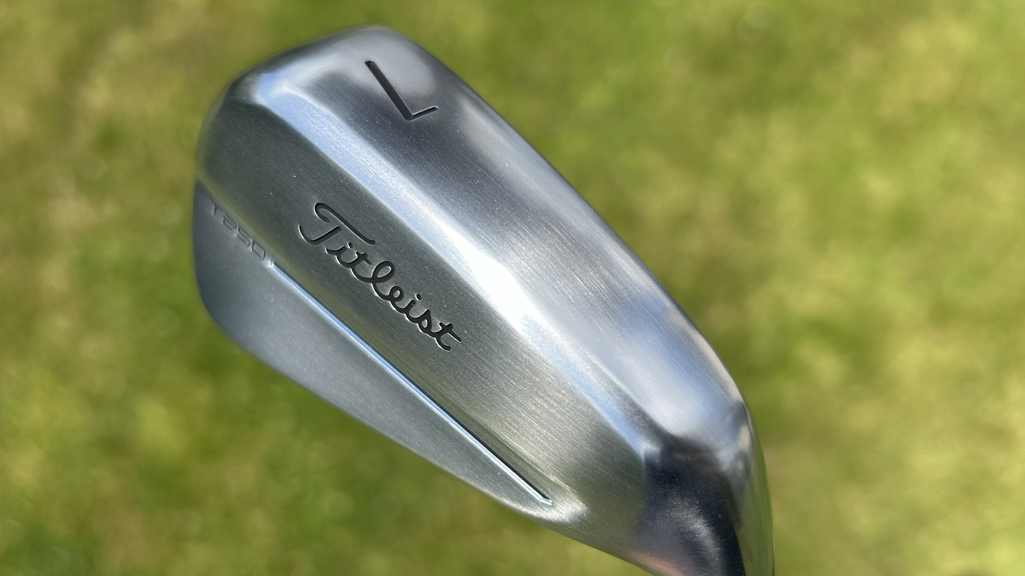 Photo of the Titleist T250 Iron sole