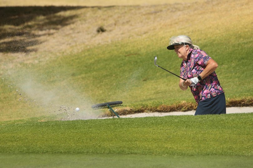 Sherry Watson popping out of the bunker at the 14th. 