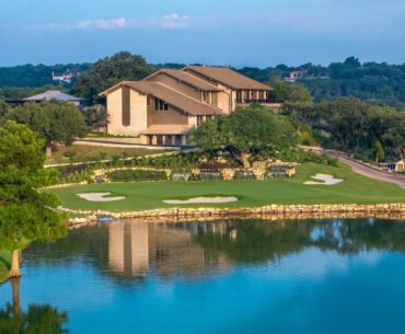 westlake country club building and golf course with lake