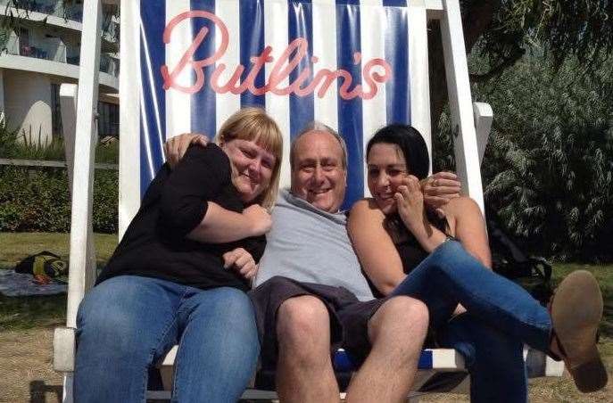 Gary Turk with his daughters Mikala, left, and Emma