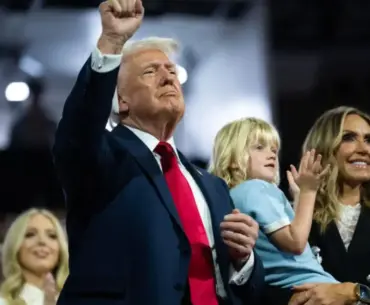 Trump Leans In for a Sweet Cuddle With Granddaughter — but Eagle-Eyed Fans Catch Her Reaction the Moment He Turned His Back