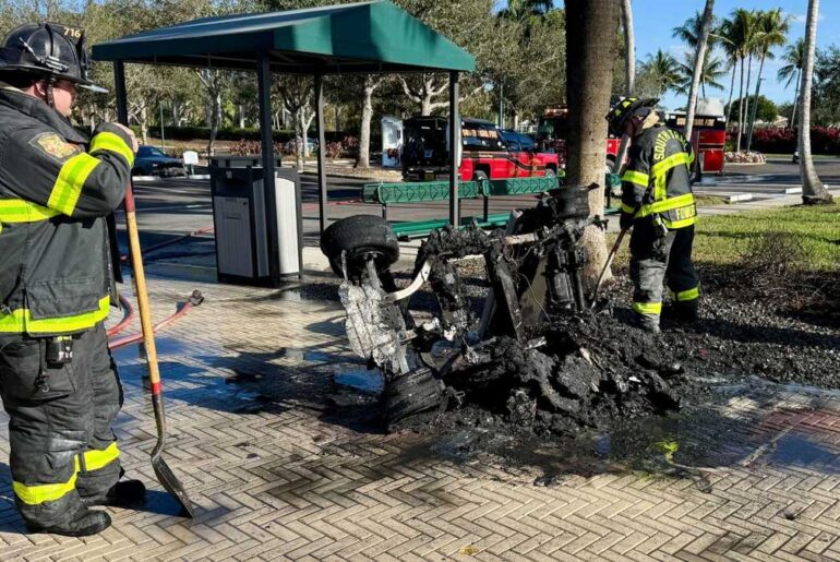 Golf cart engulfed by flames near structure at Legends Golf and Country Club in Lee County