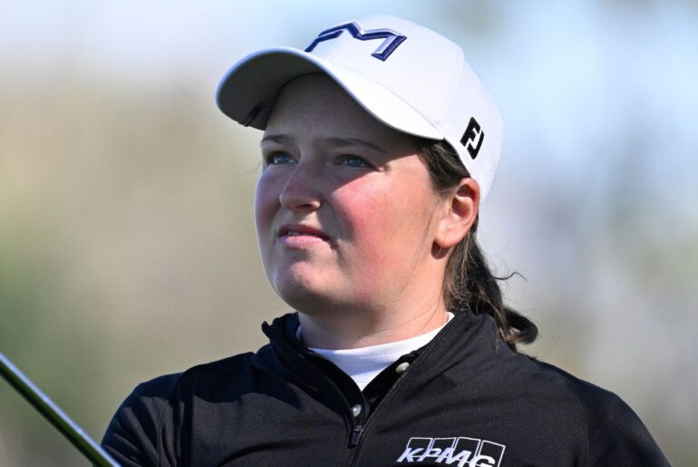 Lottie Woad of England, watches the flight of the ball after hitting from the seventh fairway during the first round of the Tournament of Champions LPGA golf tournament, Thursday, Jan. 29, 2026, in Orlando, Fla. (AP Photo/Phelan M. Ebenhack)