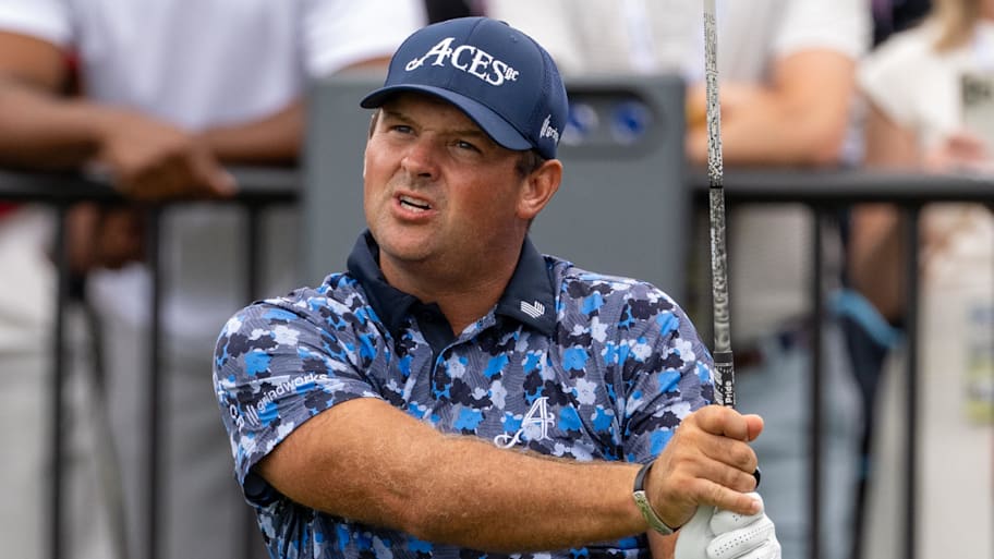 Patrick Reed of 4 Aces GC reacts to his tee shot on the first hole during  the final round of LIV Golf Indianapolis in 2025.