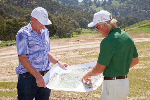 David Evans and Greg Norman, pictured back in 2017, realised their dream for Cathedral.