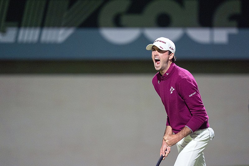 LIV Golf photo by Pedro Salado via AP / Elvis Smylie celebrates after his final putt on the 18th green during Saturday's closing round of an LIV Golf League tournament at Riyadh Golf Club.