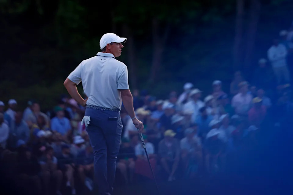 Rory McIlroy plays from the fairway on the 15th green during the third round of the 2025 Masters Tournament at Augusta National Golf Club.