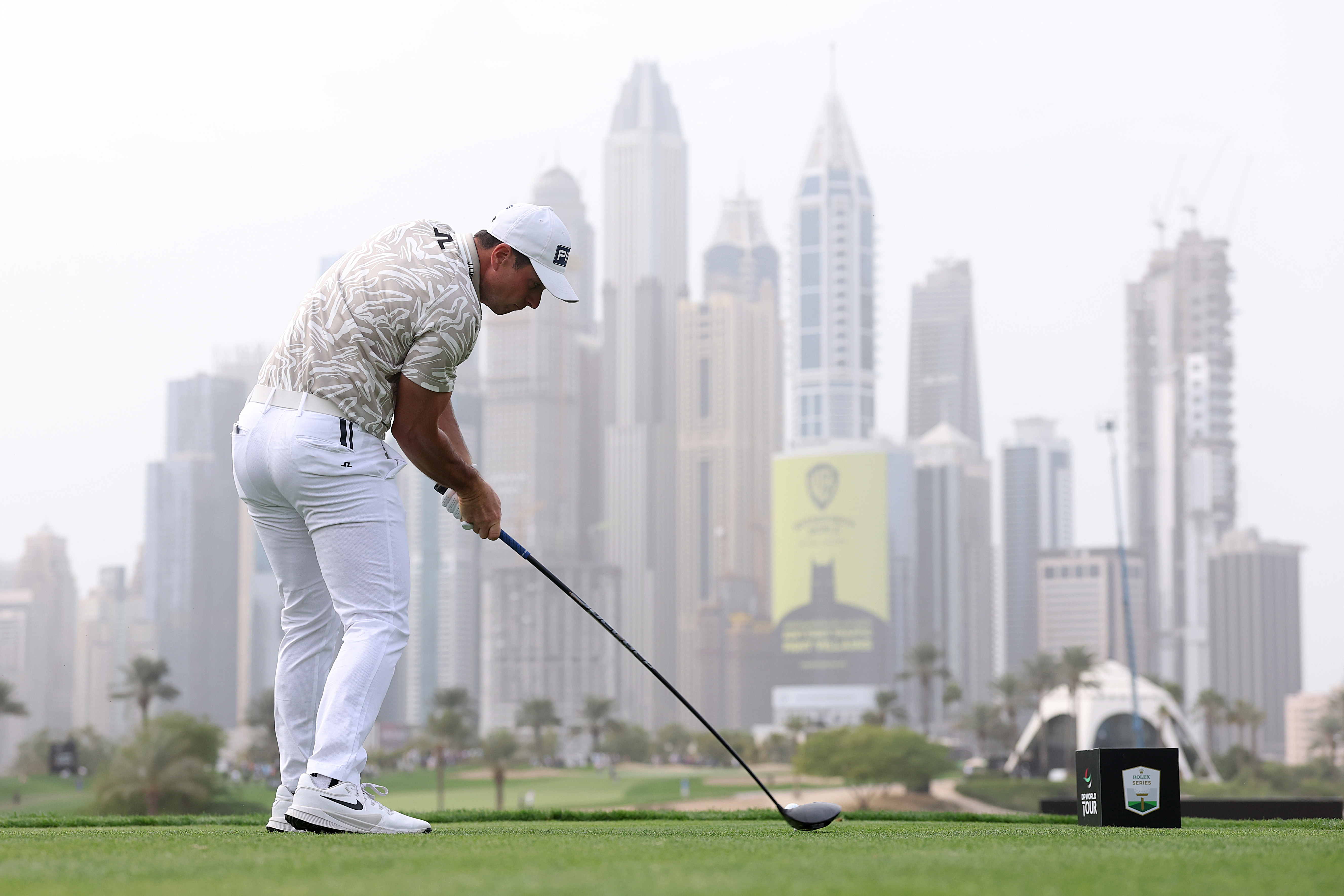 Viktor Hovland hits a driver off the tee
