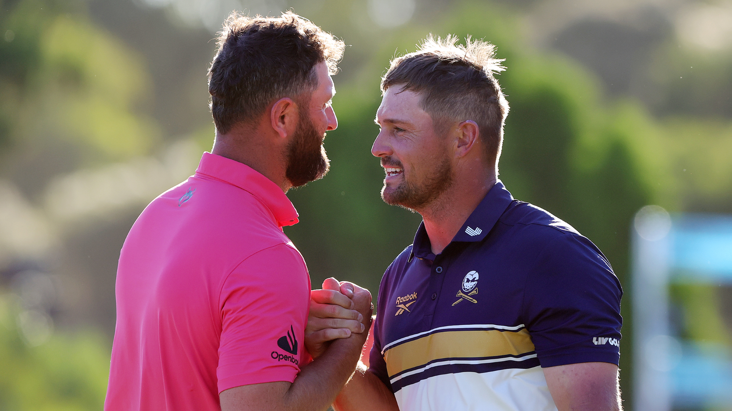 Jon Rahm and Bryson DeChambeau shake hands at LIV Golf Adelaide