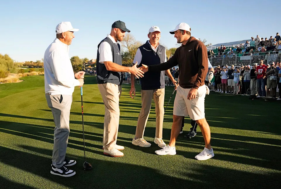 Scottie Scheffler greets Kansas City Chiefs tight end Travis Kelce on the first tee box ahead of the 2026 Annexus Pro-Am at the WM Phoenix Open.