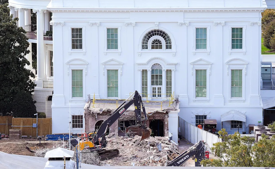 An excavator works to clear rubble after the East Wing of the White House was demolished on October 23, 2025. / Eric Lee/Getty Images