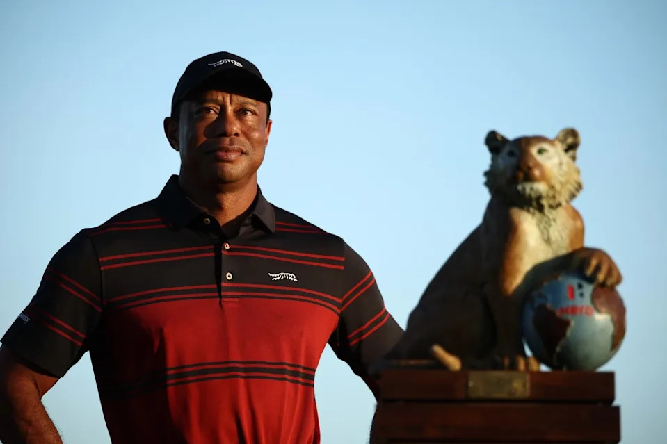 Tiger Woods of the United States stands with the trophy on the 18th green during the final round of the Hero World Challenge 2025 at Albany Golf Course on December 07, 2025 in Nassau, Bahamas. Getty Images