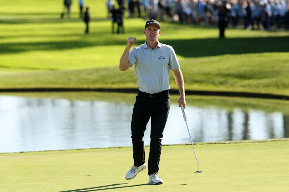 Justin Rose celebrates after winning the Farmers Insurance Open on Feb. 1. Getty Images