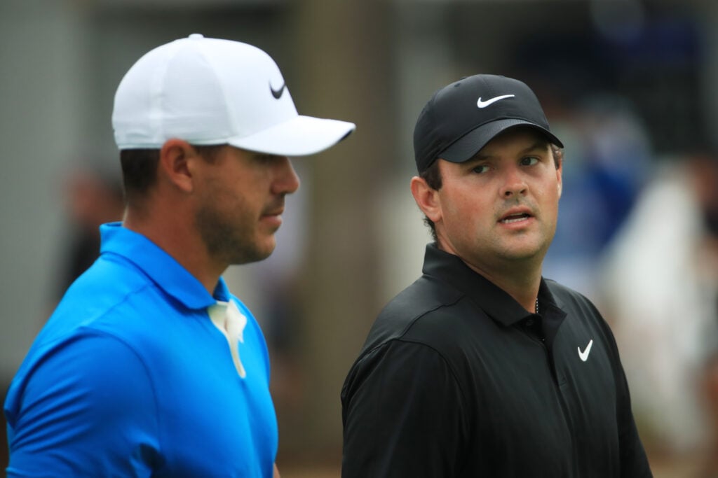 Brooks Koepka and Patrick Reed on the first hole during the third round of the BMW Championship at Medinah Country Club