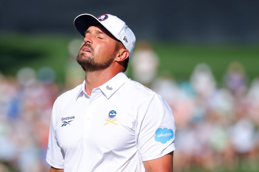 Bryson DeChambeau looks frustrated during the third round of the PGA Championship at Quail Hollow