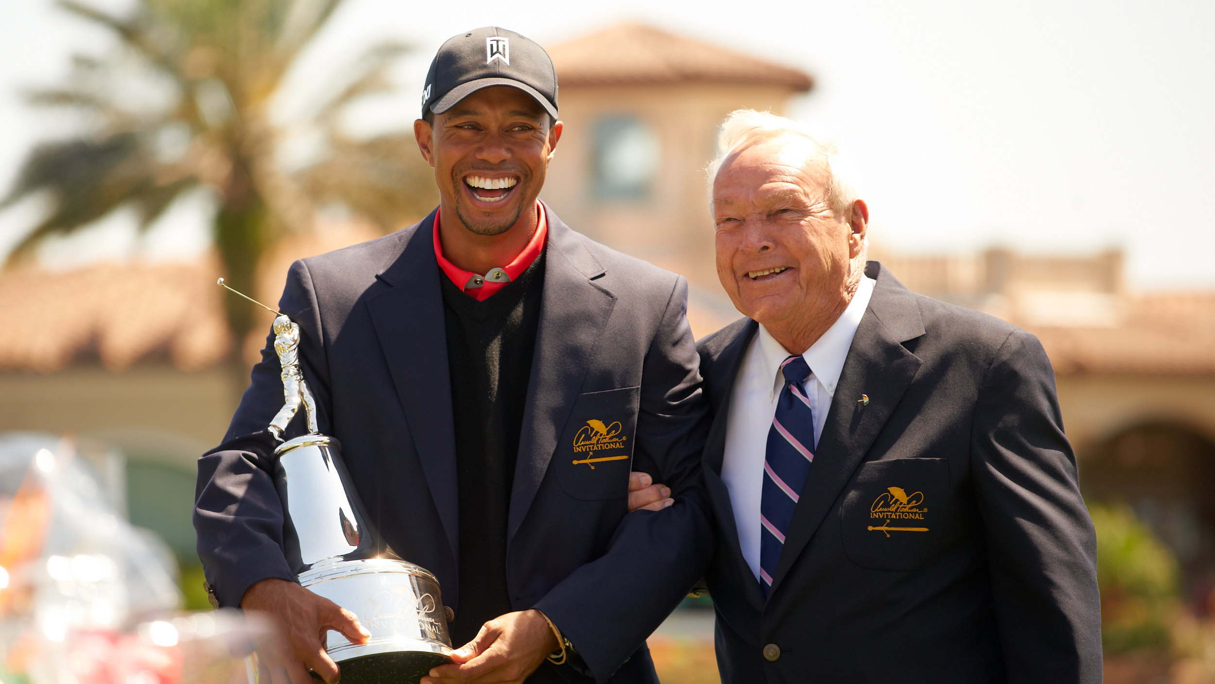 Tiger Woods and Arnold Palmer with the Arnold Palmer Invitational trophy