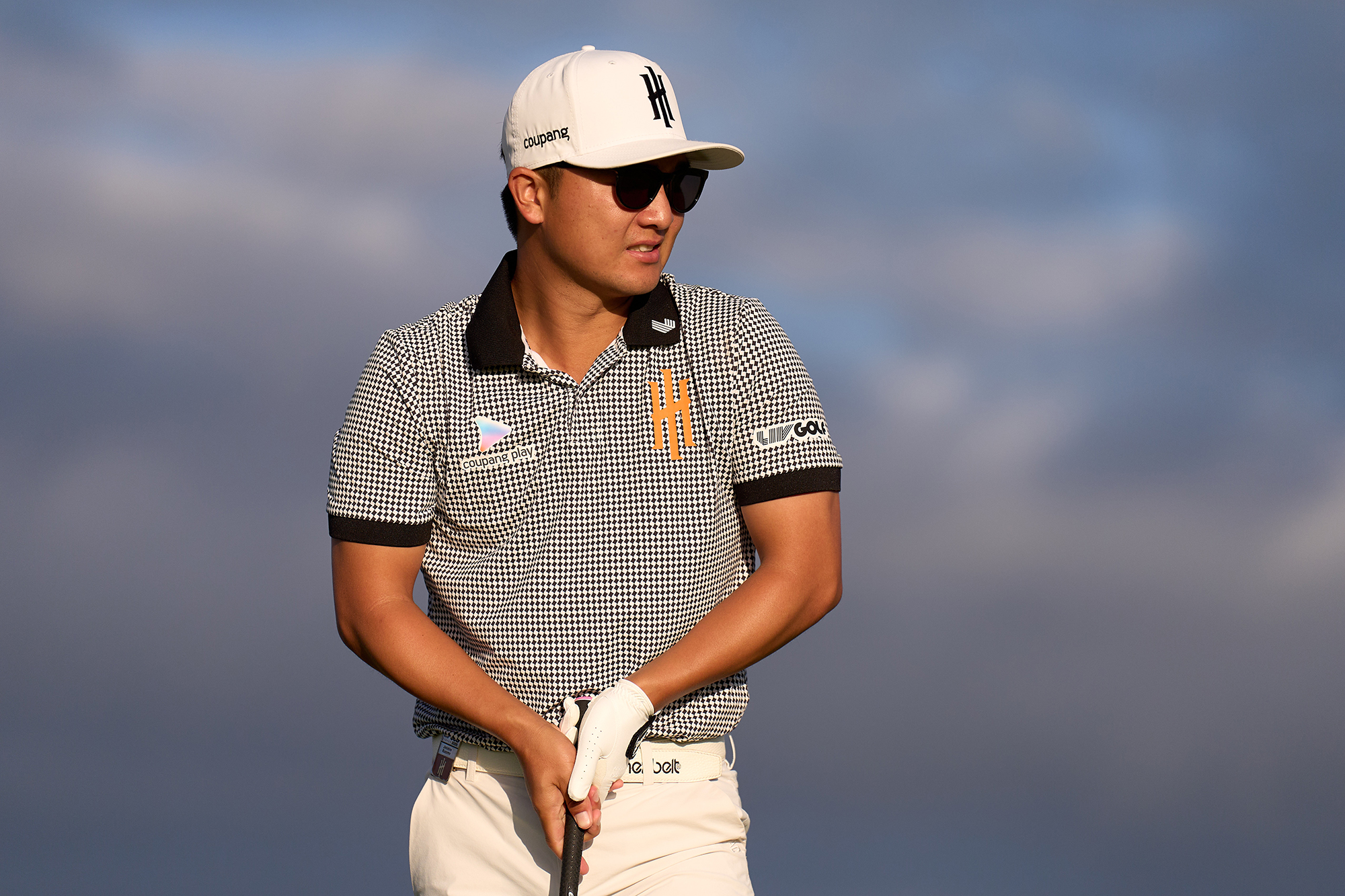 Jinichiro Kozuma wearing a LIV Golf team shirt during the 2025 season before losing his place in 2026