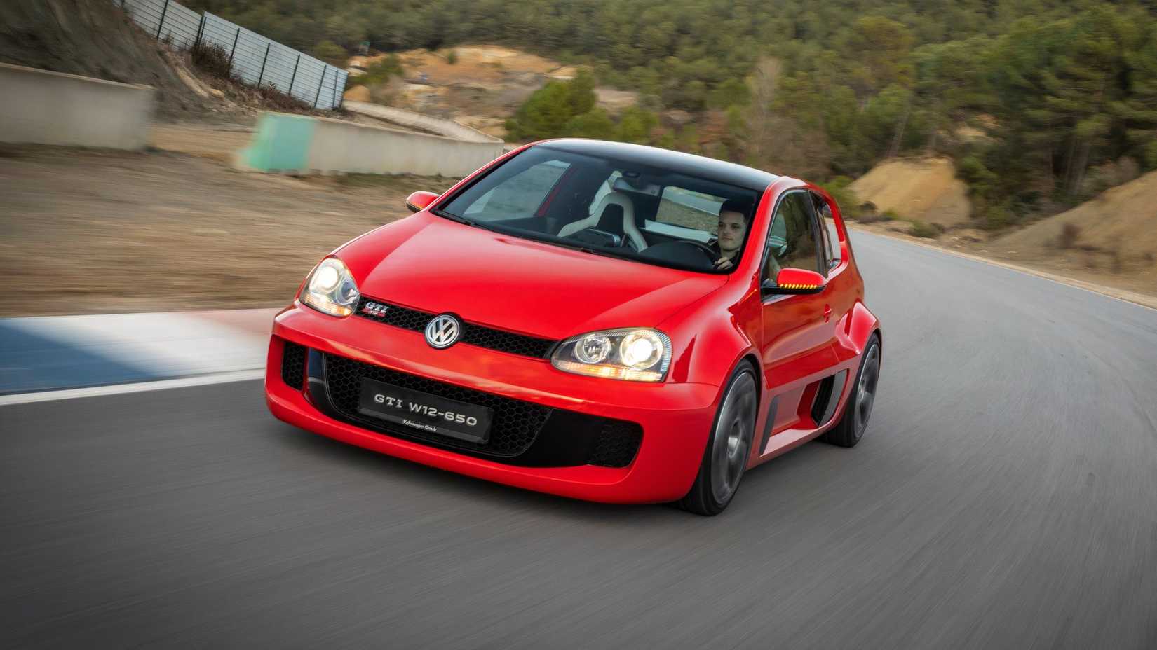 Volkswagen Golf GTI W12-650 driving on the street