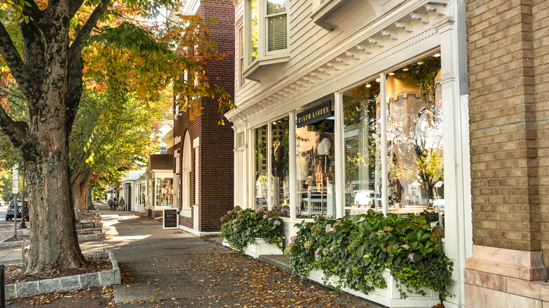 sidewalk and shops in downtown village area of Southampton New York