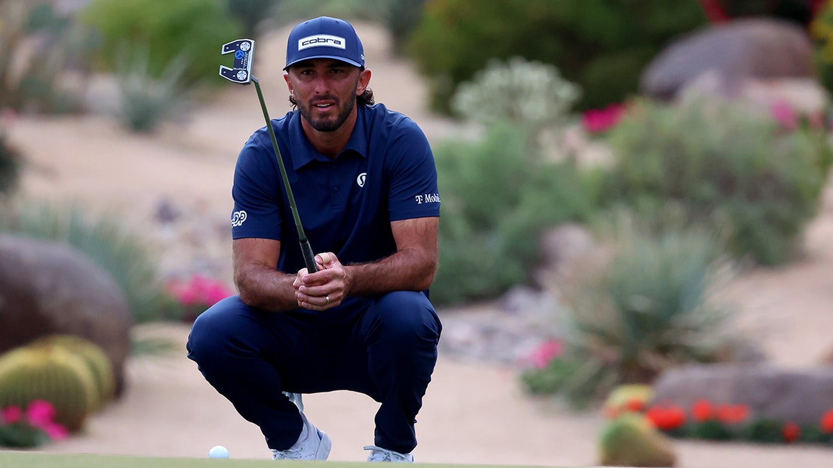 Max Homa lines up putt