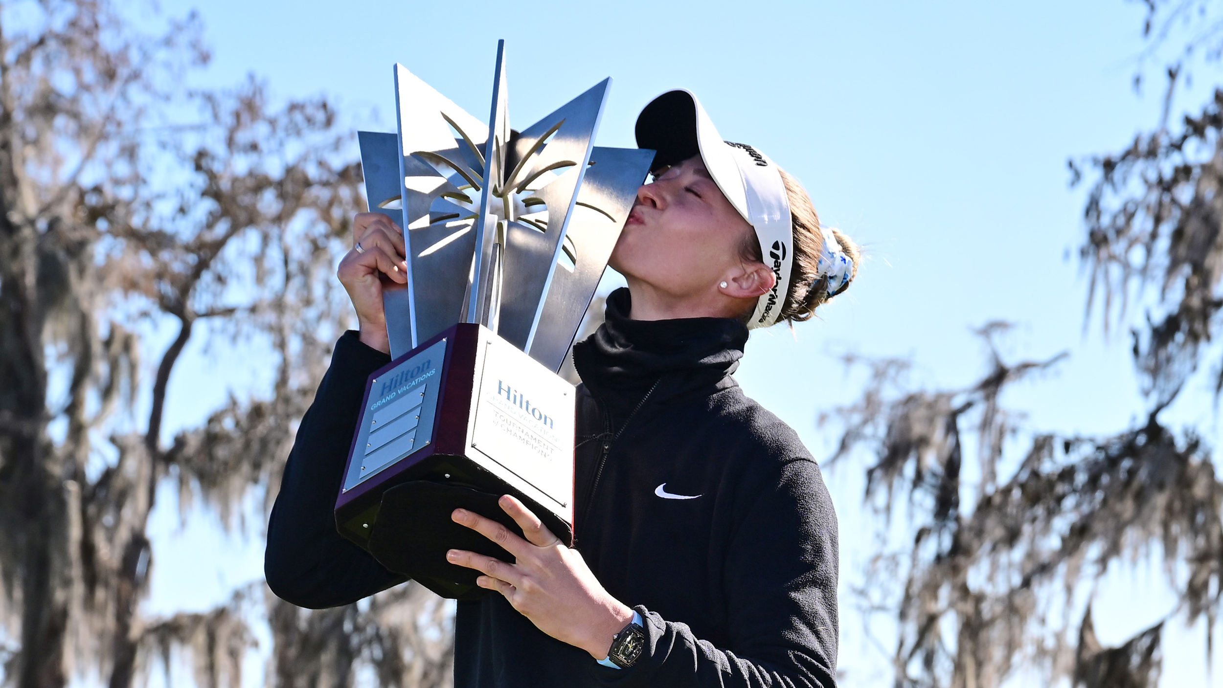 Nelly Korda kisses the Hilton Grand Vacations Tournament of Champions trophy after her win in 2026