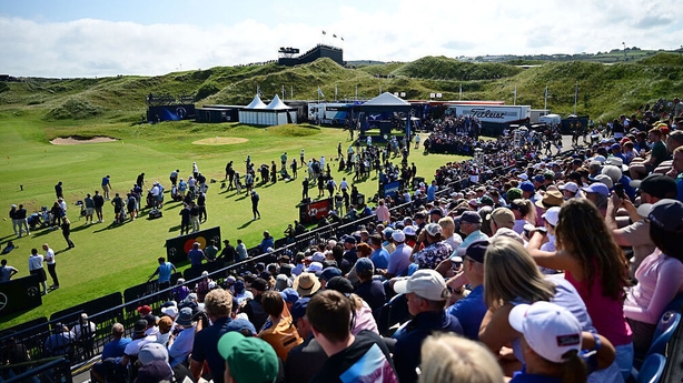 Spectators look across the driving range prior to The 153rd Open Championship at Royal Portrush Golf Club 