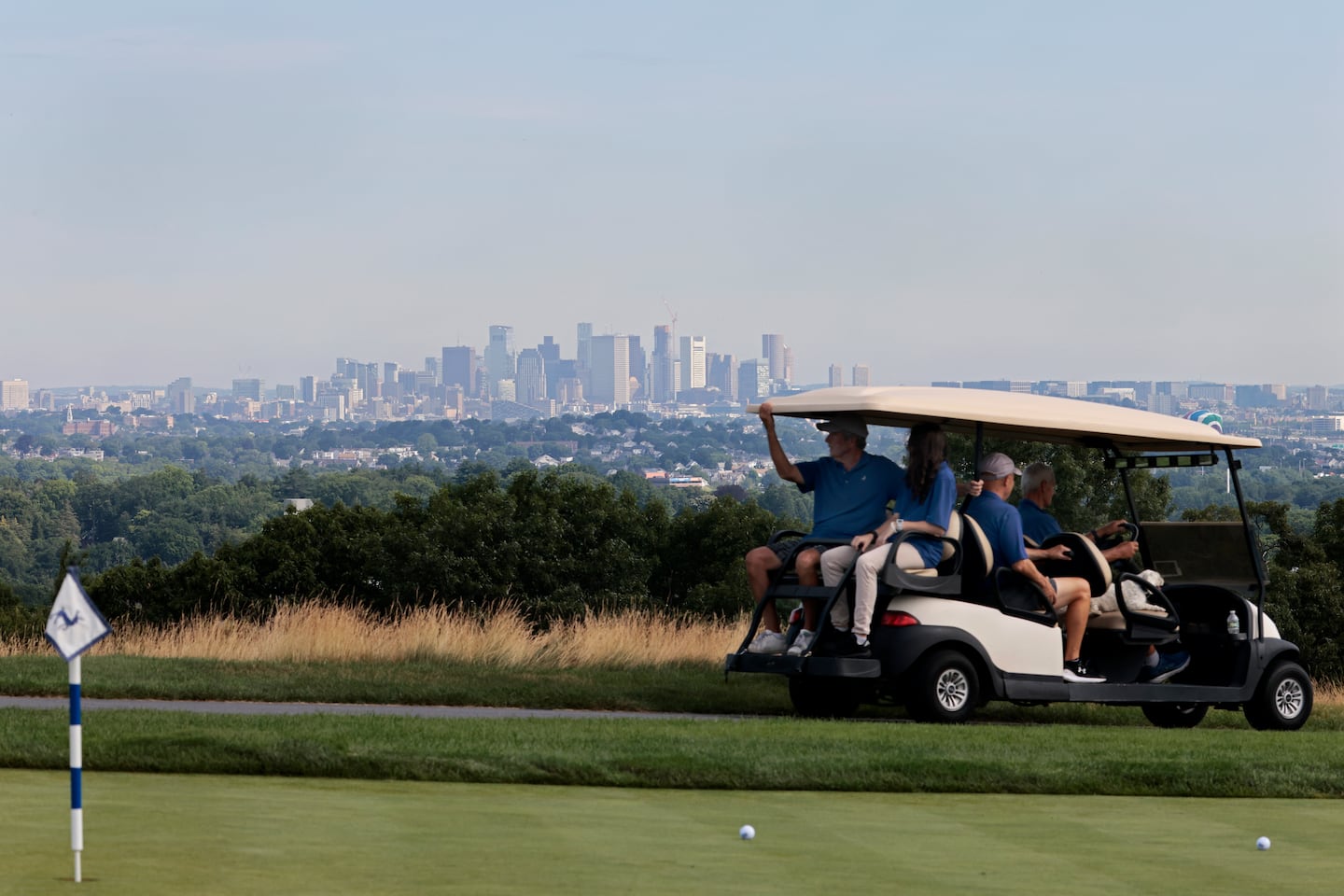 A haze hangs over the Boston skyline, as seen from the Granite Links Golf Club in Quincy in 2024.