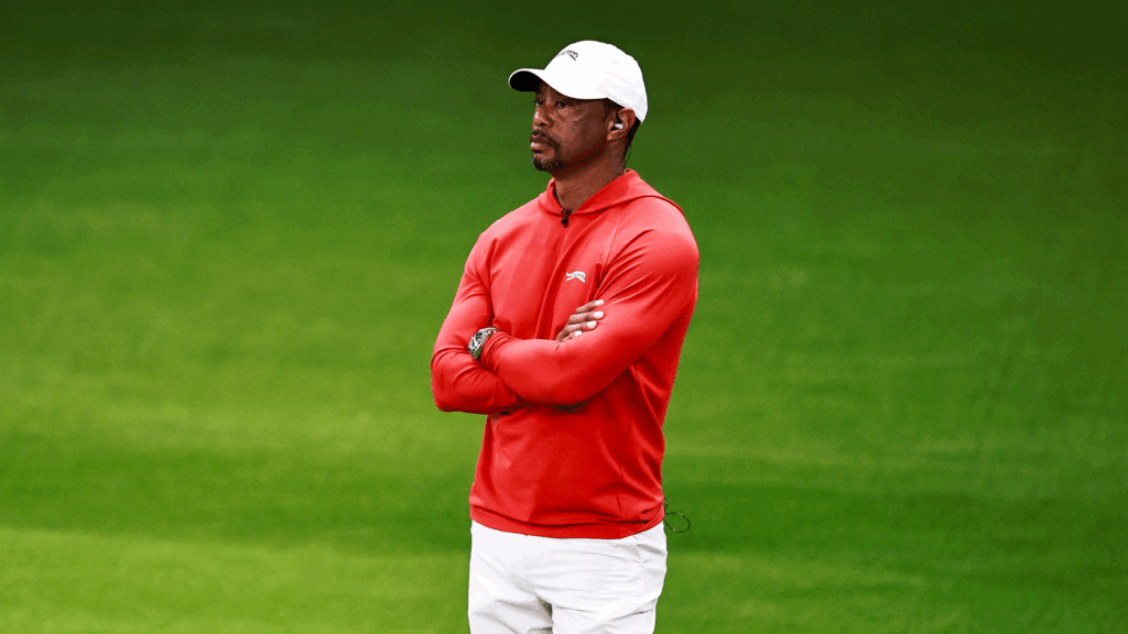 Tiger Woods stands with his arms crossed during the TGL semi-finals in 2026