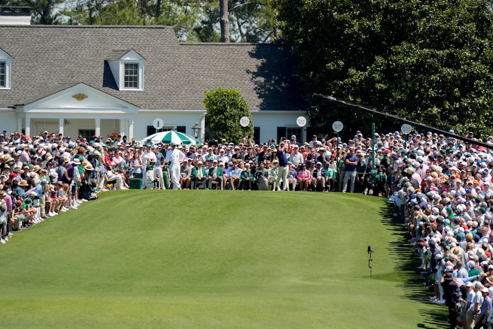 Bryson DeChambeau tees off on no. 1 during the final round of the Masters Tournament at Augusta National Golf Club.