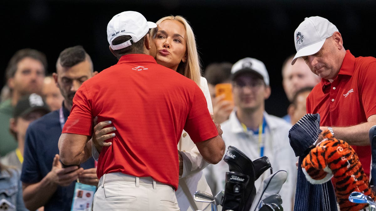 Tiger Woods and Vanessa Trump share a kiss at TGL finals in Florida