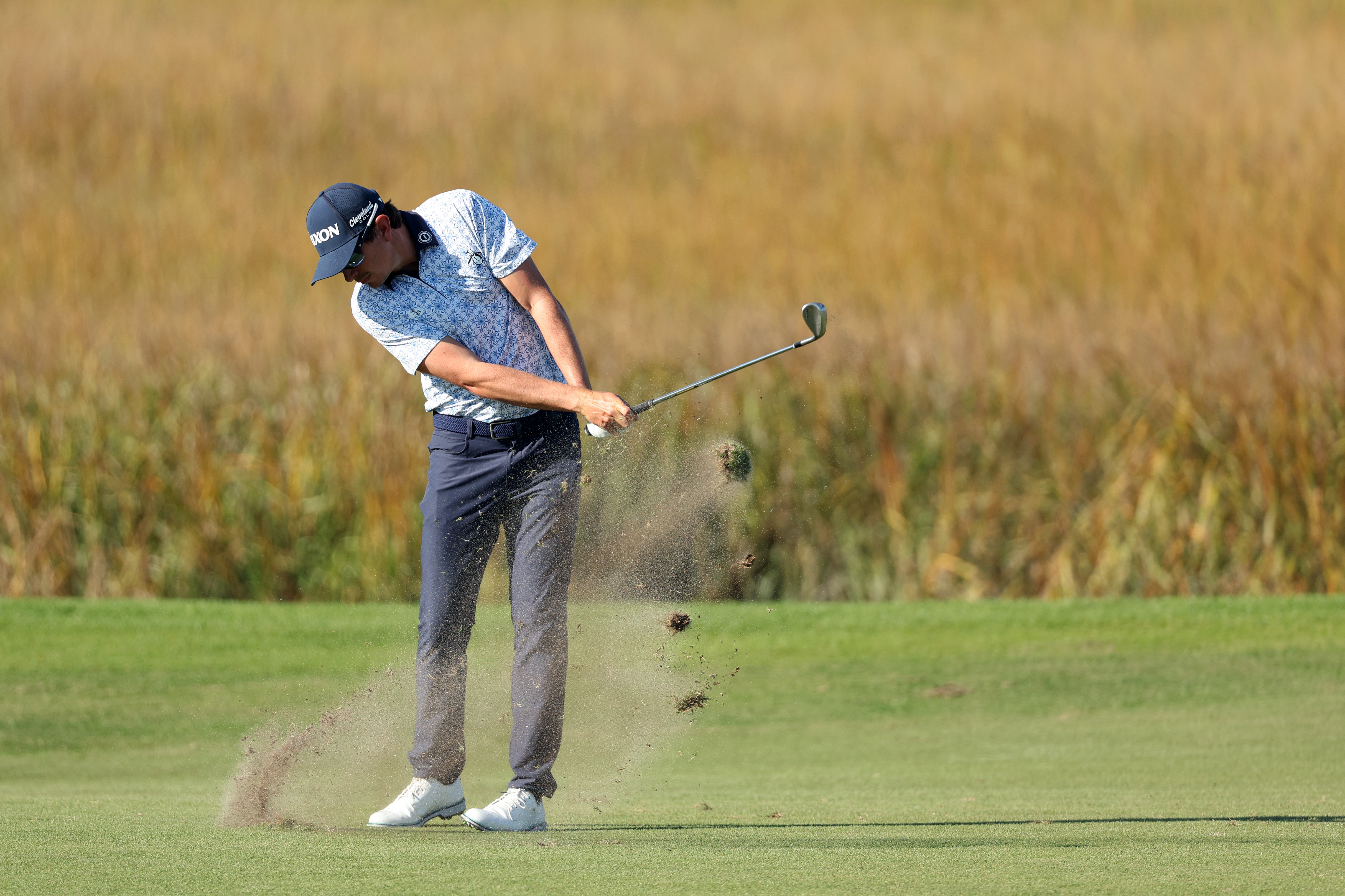 Nico Echavarria hits a wedge shot