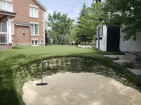 The sod-walled turf bunker is a unique element in a backyard green.