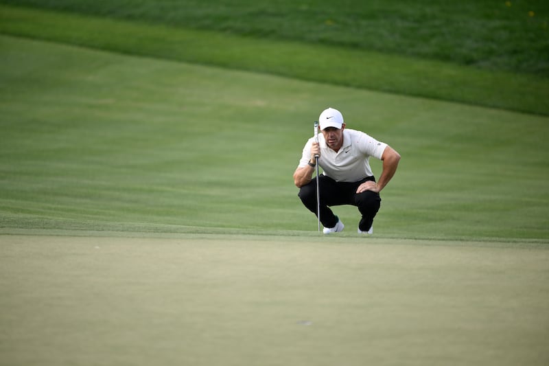 Rory McIlroy of Northern Ireland lines up a putt on the second hole during the second round of the Arnold Palmer Invitational. Photograph: Orlando Ramirez/Getty