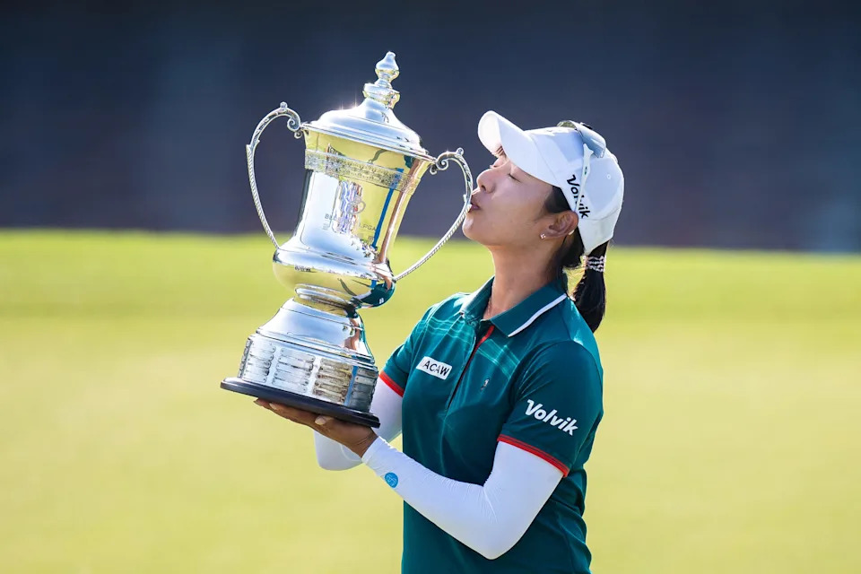 Mi Hyang Lee of South Korea kisses the trophy after winning the 2026 LPGA Blue Bay golf tournament at the Jian Lake Blue Bay Golf Club in Lingshui, on China's southern Hainan island on March 8, 2026.