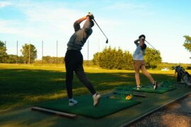Golfers on a driving range