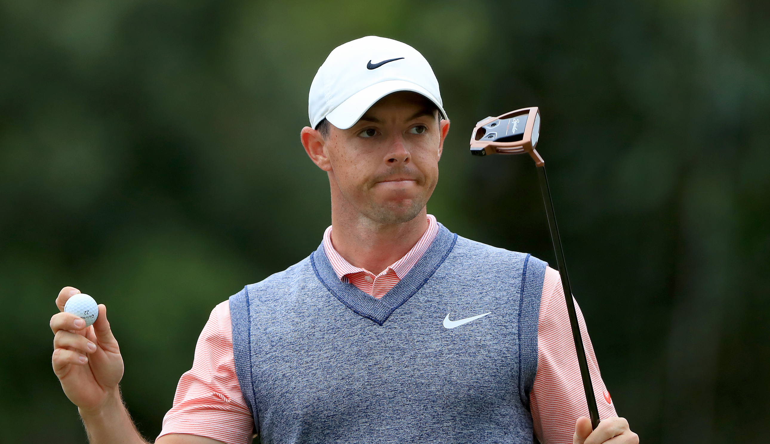 Rory McIlroy waves to the crowd