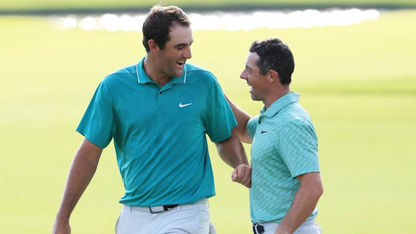Scottie Scheffler congratulates Rory McIlroy on the 18th green after the final round of the 2022 TOUR Championship. (Sam Greenwood/Getty Images)