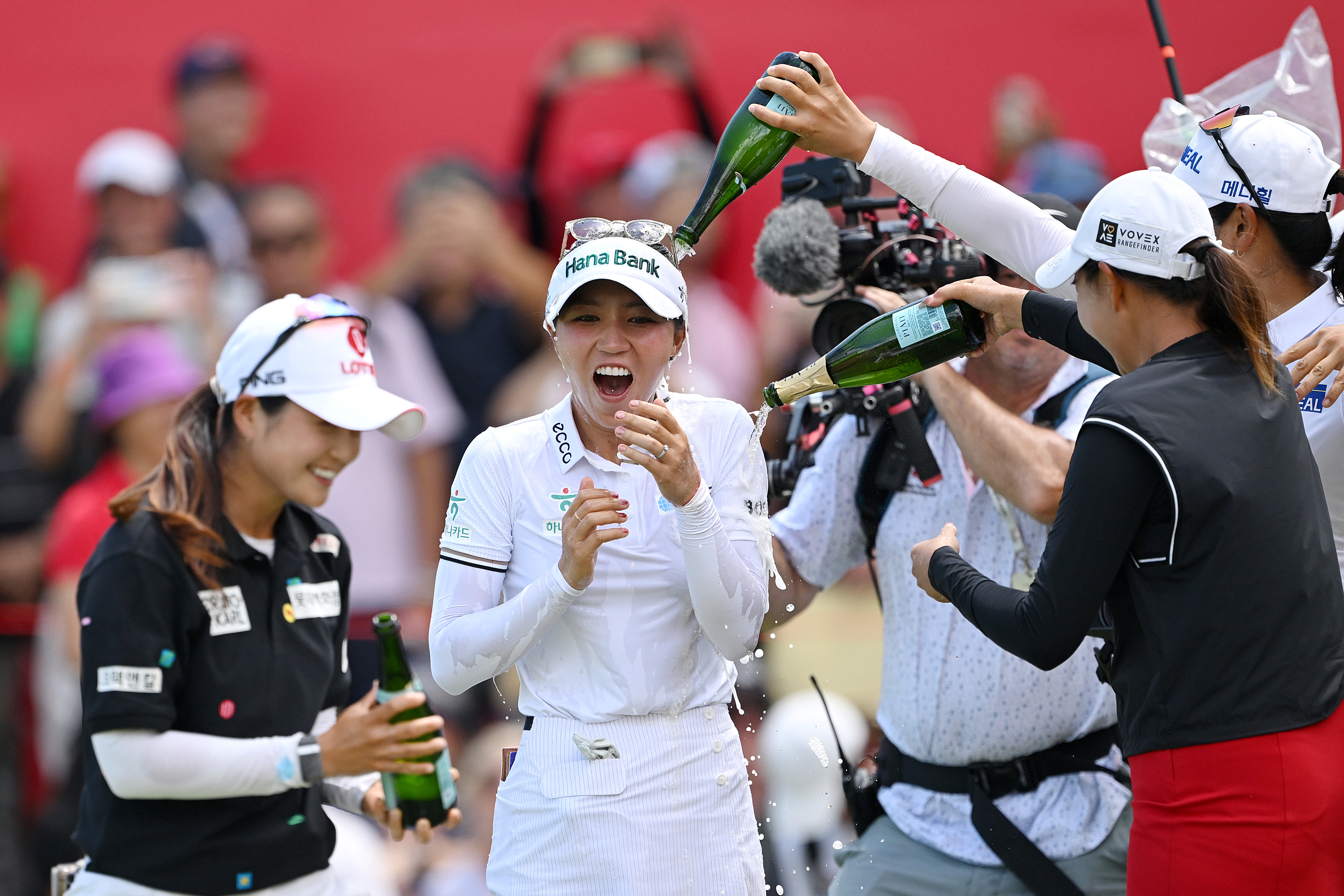 Lydia Ko is doused in champagne after winning the HSBC Women's World Championship at Sentosa Golf Club in 2025