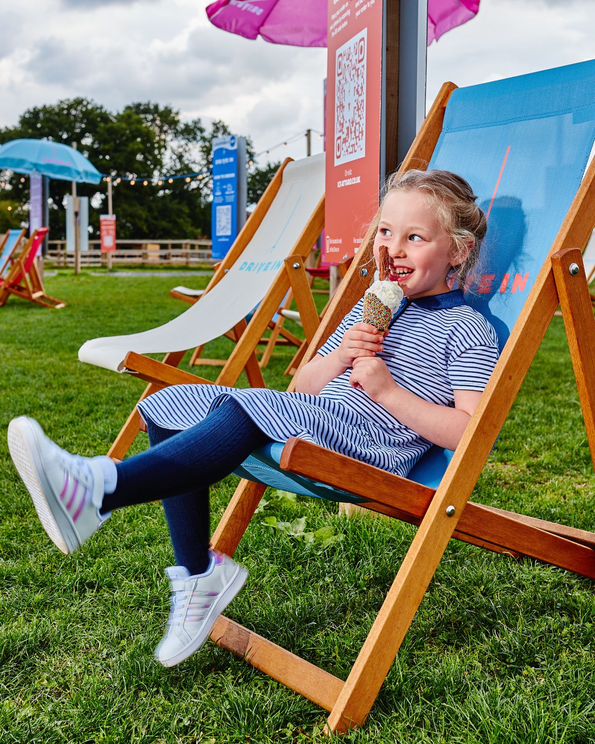 Visitors can relax on the deck chairs by the lake
