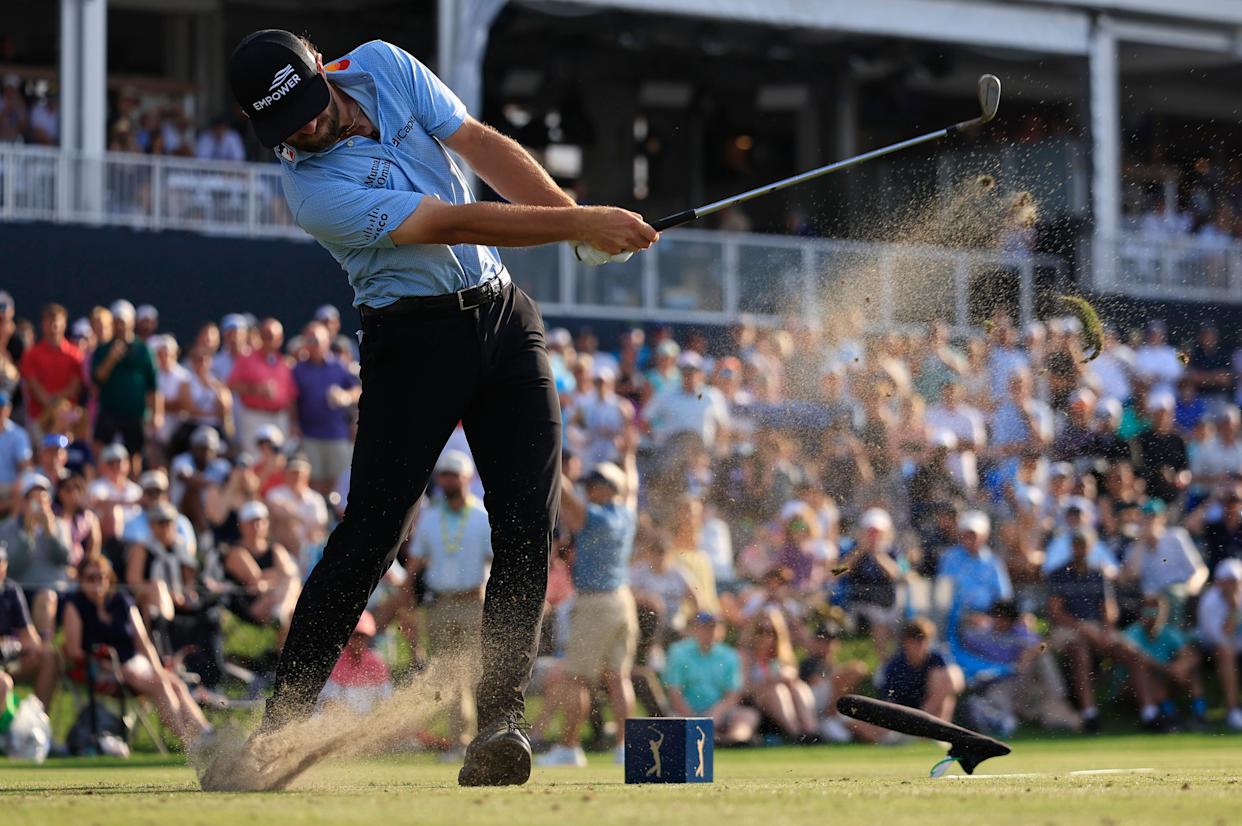 Cameron Young tees off on the 17th hole during the fourth round of The Players Championship PGA golf tournament at TPC Sawgrass, Sunday, March 15, 2026, in Ponte Vedra Beach, Fla. Cameron Young won the tournament at 13 under par, one stroke over Matt Fitzpatrick.