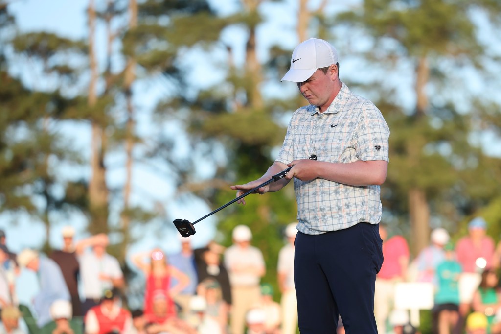 Robert MacIntyre of Scotland lines up a putt on the 18th green during the first round of the 2026 Masters Tournament at Augusta National Golf Club on April 09, 2026 in Augusta, Georgia. 