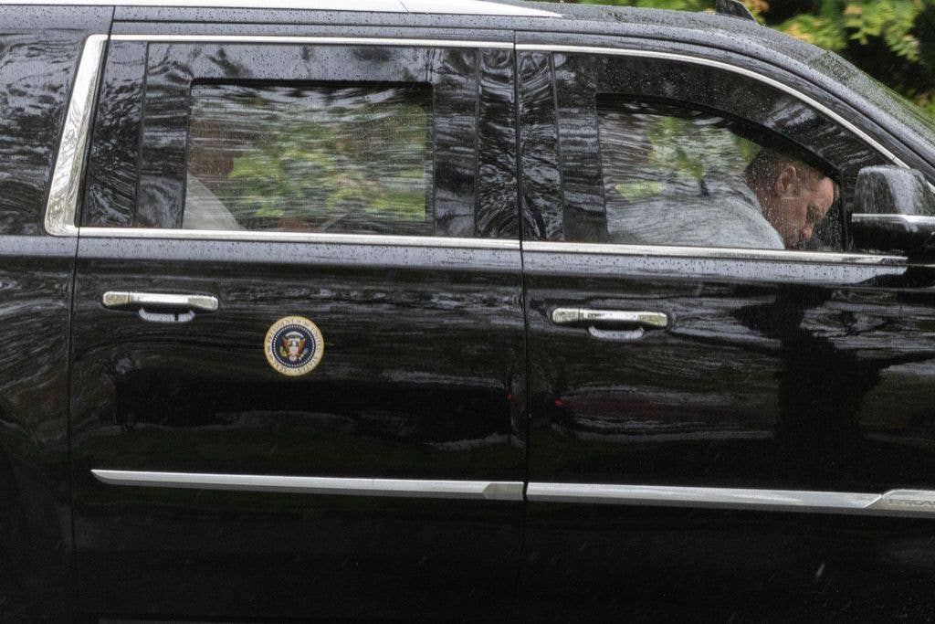 US President Donald Trump leaves Trump National Golf Club on Eater Sunday