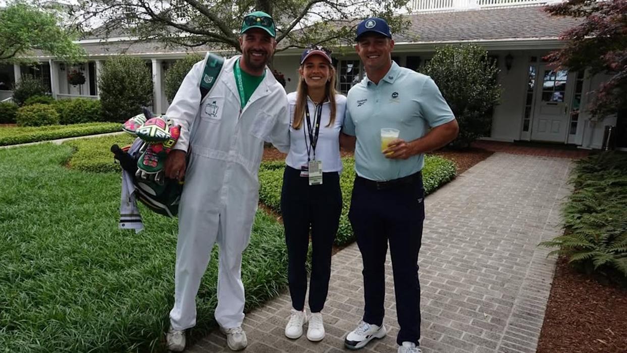 Kai Trump posing for a photo with Bryson DeChambeau at Augusta National Golf Club