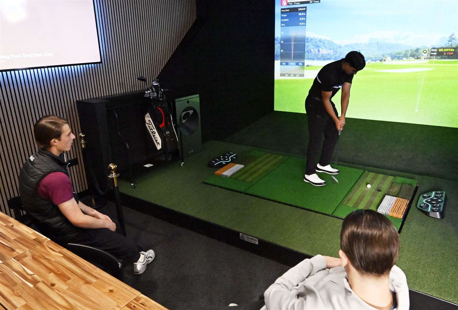 The simulator has a state-of-the-art moving plate, as well as fairway, bunker, and rough lies to match the course. Picture: Barry Goodwin