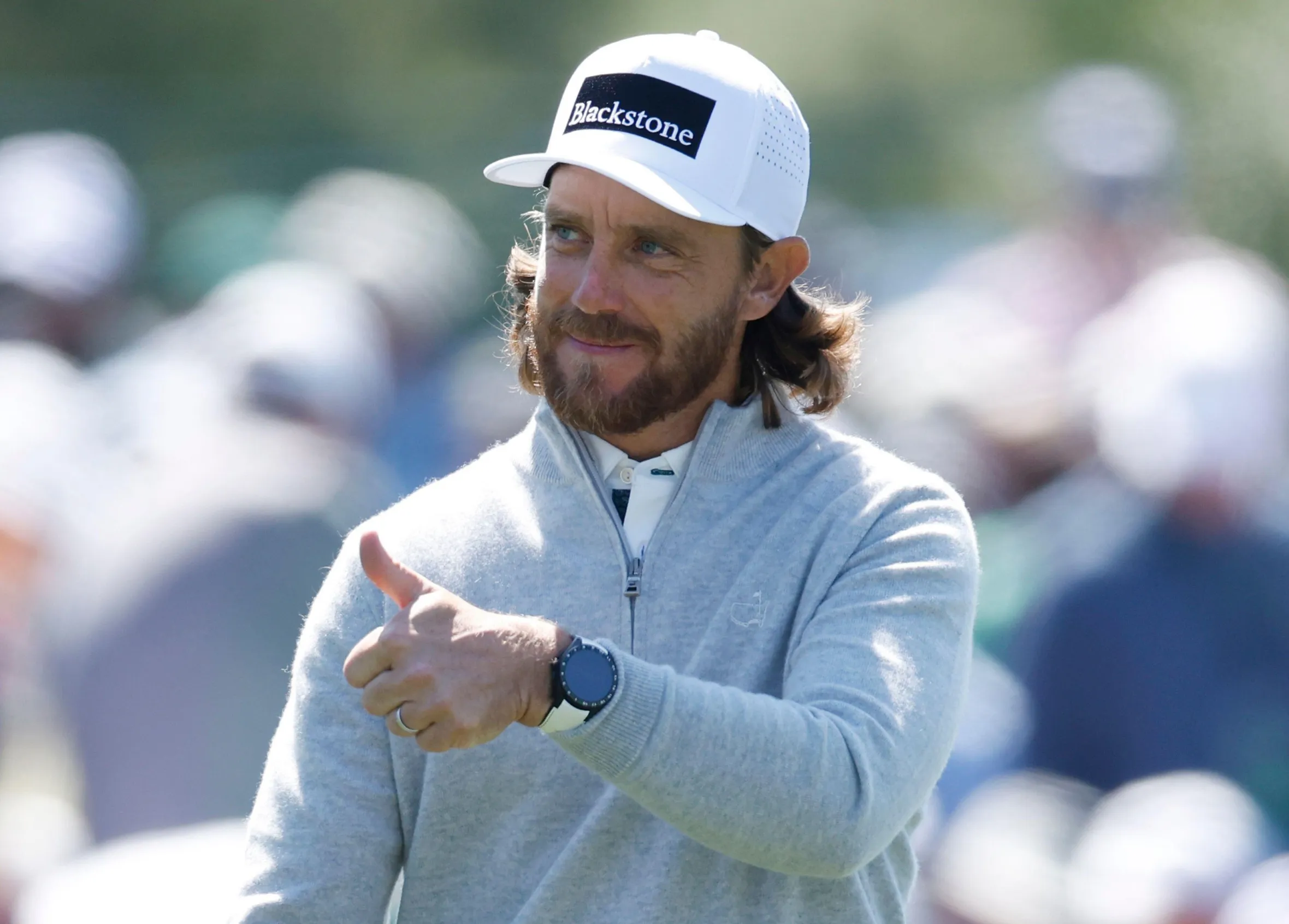 Augusta, United States. 09th Apr, 2026. Tommy Fleetwood of England gives a thumbs-up as he walks from the 8th tee during the first day of the Masters Tournament at Augusta National Golf Club on Thursday, April 9, 2026, in Augusta, Georgia. Photo by J