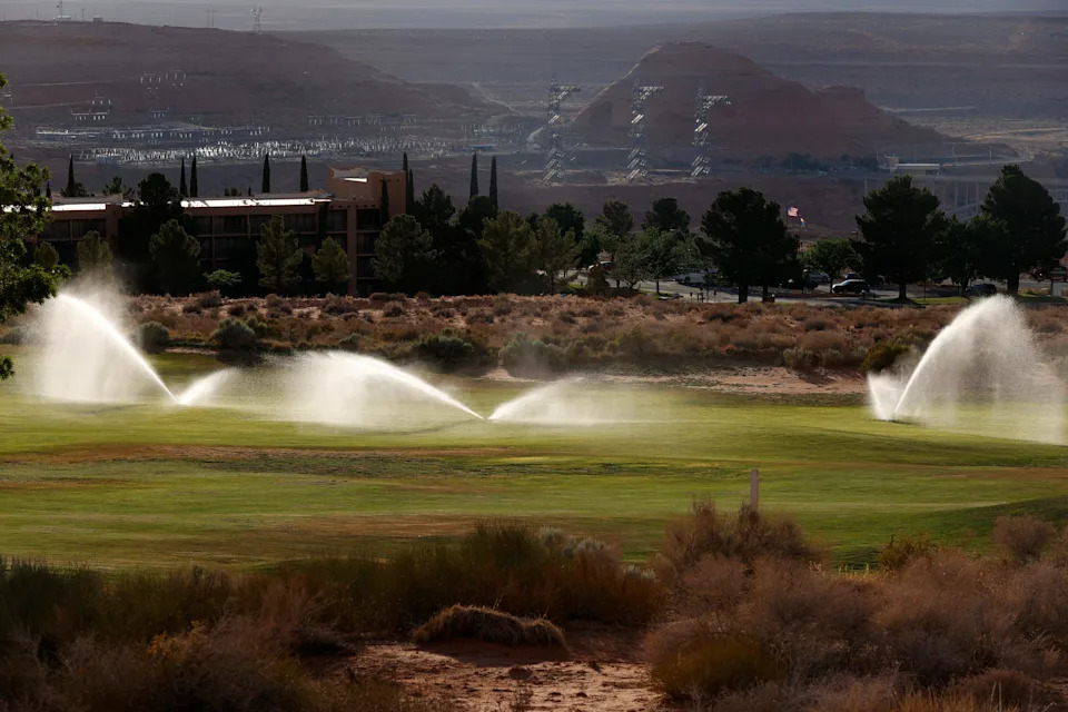 Sprinklers water grass at the Lake Powell National Golf Course on June 24, 2021 in Page, Arizona.
