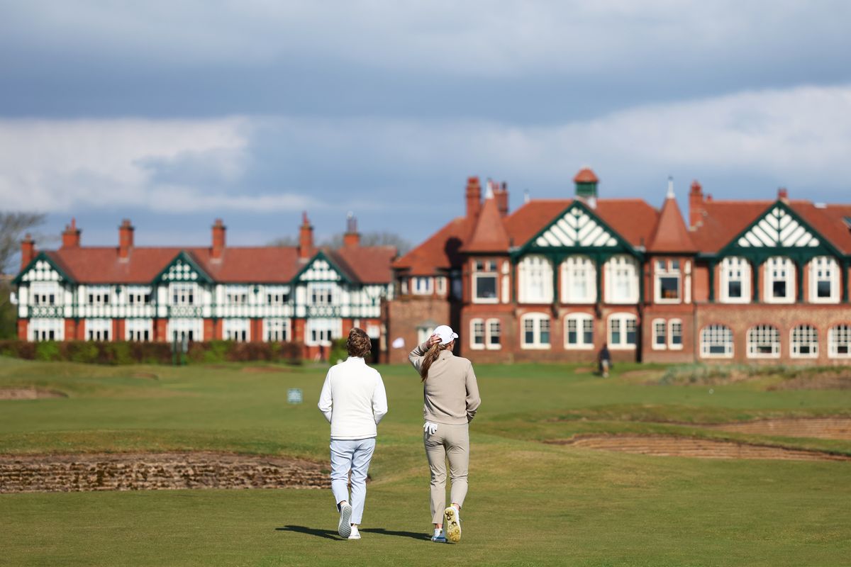 LYTHAM ST ANNES, ENGLAND - APRIL 28: Catriona Matthew of Scotland walks with Mimi Rhodes of England on the 18th hole at Royal Lytham & St. Annes on April 28, 2026 in Lytham St Annes, England. (Photo by Jan Kruger/R&A/R&A via Getty Images)