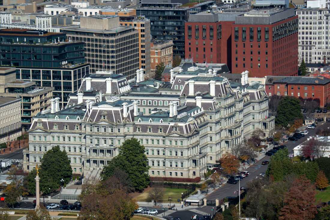 The grey granite and ornate details of the Eisenhower Executive Office Building set it apart from the surrounding architecture.